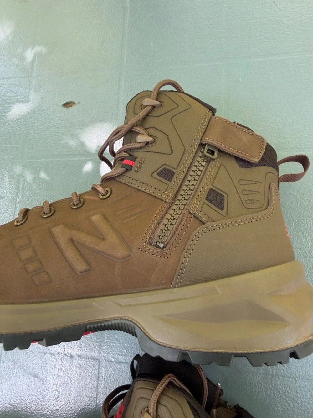 New Balance Calibre Brown Men's Waterproof Hiking Boots with Red Accents
